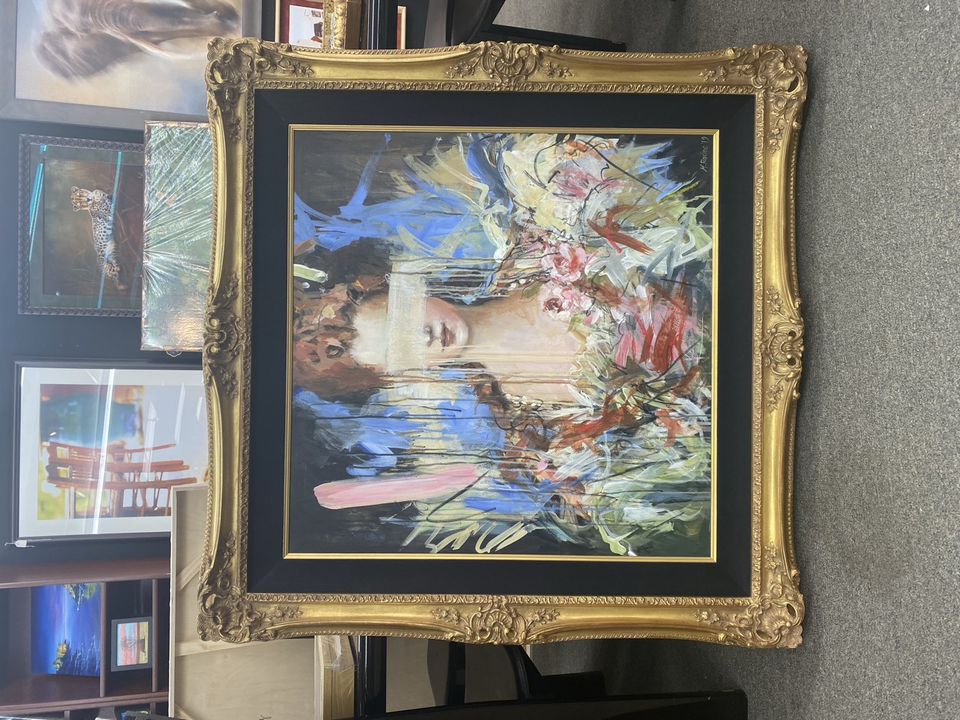 Framed fine-art portrait in a gilded frame